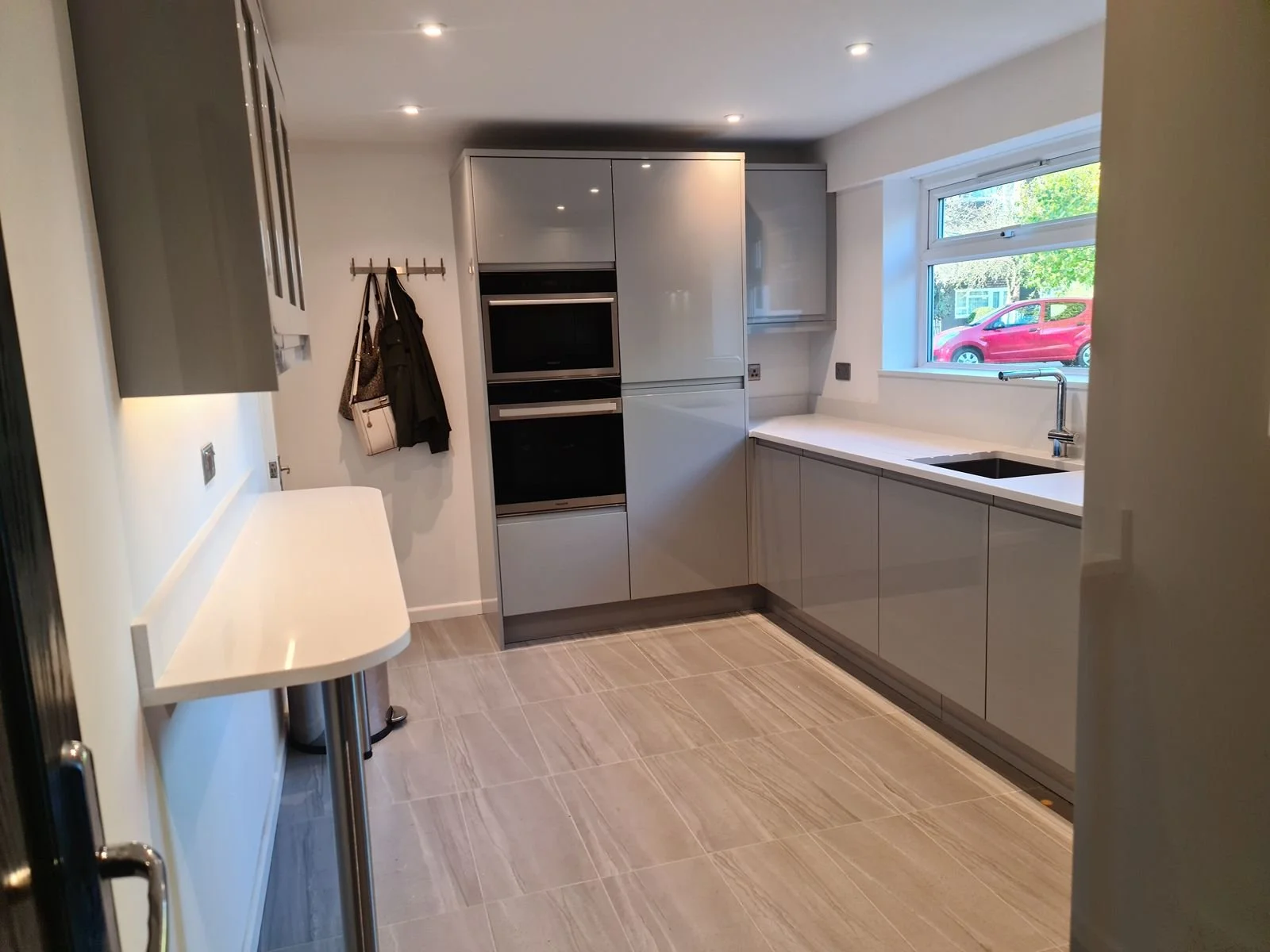 A grey galley kitchen fitted by Chiltern Installations